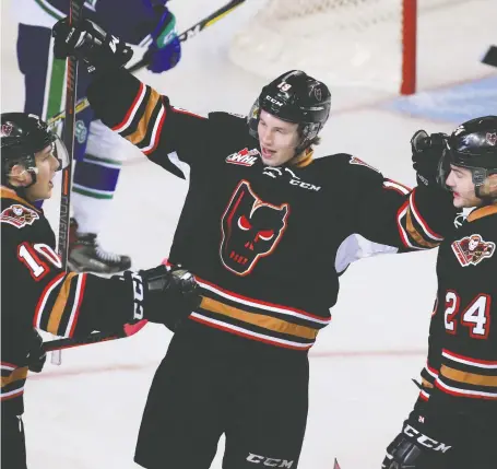  ?? GAVIN YOUNG/FILES ?? When the Calgary Hitmen return to the ice next Western Hockey League season, the stands will be at 50 per cent capacity, at least.