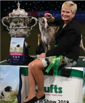  ??  ?? „ Tease with owner Yvette Short after the whippet was named Best In Show at Crufts.