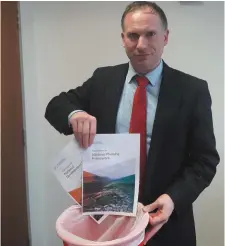  ??  ?? Yours, Anthony Moore, Fianna Fail Anthony Moore dumping the 2040 Plan in the bin