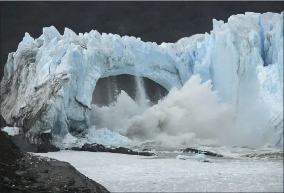  ?? FRANCISCO MUNOZ — THE ASSOCIATED PRESS FILE ?? Chunks of ice break off the Perito Moreno Glacier in Lake Argentina at Los Glaciares National Park, near El Calafate, in Argentina’s Patagonia region in March 2016. As glaciers melt and pour massive amounts of water into nearby lakes, 15million people across the globe live under the threat of a sudden and deadly outburst flood, a new study finds.