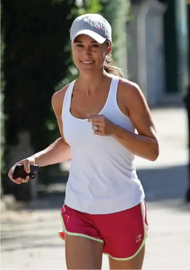  ?? PHILIP TOSCANO/THE ASSOCIATED PRESS ?? Pippa Middleton and her gigantic engagement ring went for a run. It has been described as costing upward of $260,000.