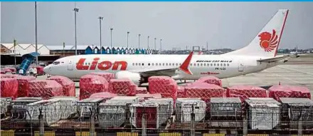 ?? BLOOMBERG PIC ?? The United States Federal Aviation Administra­tion has asked airlines to report any cracks on their Boeing 737 NG aircraft so it can assess whether it needs to change its inspection orders, following Lion Air’s discovery of structural cracks on two planes.