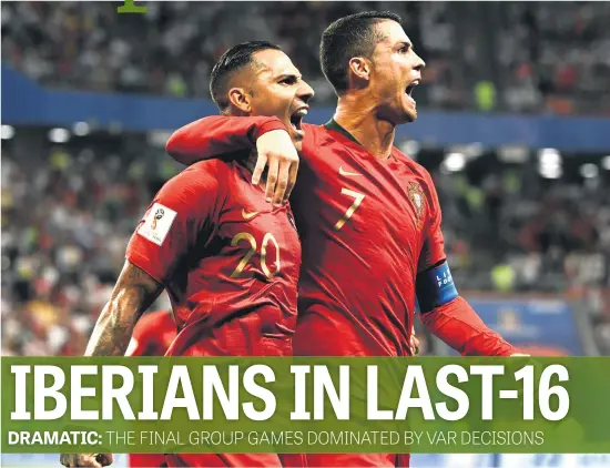  ?? Picture: AFP ?? URUGUAY IS NEXT. Portugal’s forward Ricardo Quaresma (L) celebrates scoring the opening goal with forward Cristiano Ronaldo during the World Cup Group B match against Iran at the Mordovia Arena last night. The game ended in a 1-all draw.