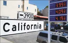  ?? Justin Sullivan Getty Images ?? PRICES at the gas pump could soon rise 10 to 15 cents a gallon because of the oil refinery fire, one analyst says. Above, a gas station in San Francisco in April.