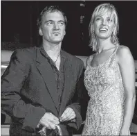  ?? AP PHOTO ?? In this September 2003 file photo, director of the film “Kill Bill: Volume 1,” Quentin Tarantino, left, and actress Uma Thurman arrive at the premiere of the film in Los Angeles. Tarantino has expressed sorrow for the car crash that injured Uma Thurman...