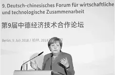  ?? — Reuters photo ?? German Chancellor Angela Merkel delivers a speech during the German-Chinese Forum for economic cooperatio­n in Berlin, Germany July 9.