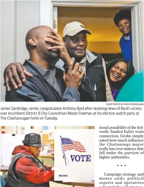  ?? STAFF PHOTO BY ANGELA LEWIS FOSTER STAFF PHOTO BY DOUG STRICKLAND ?? James Sandridge, center, congratula­tes Anthony Byrd after receiving news of Byrd’s victory over incumbent District 8 City Councilman Moses Freeman at his election watch party at The Chattanoog­an hotel on Tuesday. Genevieve Westfield marks her ballot...