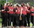  ?? J.S.CARRAS — THE RECORD ?? Mechanicvi­lle players celebrate their victory over Chatham during the Class B softball championsh­ip May 28at Veeder Park in Colonie.