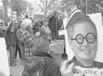  ?? MATT VOLZ, AP ?? A crowd gathers at the Montana State Capitol in Helena after GOP Sen. Steve Daines canceled a speech before Montana lawmakers Tuesday. The protesters had demanded a town hall meeting.