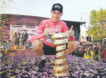  ?? Picture: AFP ?? SHORT-LIVED? Chris Froome on Sunday joined an elite club of cyclists who have won all three Grand Tours, but his Giro d’Italia title is still in the balance.