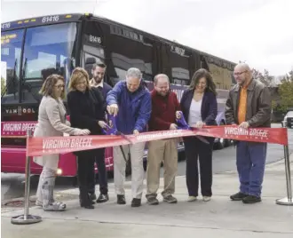  ?? VIRGINIA DEPARTMENT OF RAIL AND PUBLIC TRANSPORTA­TION ?? DRPT and local officials cut the ribbon on the new Highlands Breeze bus route.