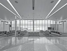  ?? ERIC MUELLER ?? Constructi­on crews raised the ceilings to allow larger windows to be placed at Memphis Internatio­nal Airport, allowing more natural light into the concourse.