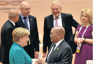  ?? /GCIS ?? Keeping in touch: President Jacob Zuma interacts with the host and chairwoman of the 2017 Group of 20 leaders summit, German Chancellor Angela Merkel, at the final session of the meeting in Hamburg, Germany.