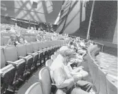  ?? DEWAYNE BEVIL/ORLANDO SENTINEL ?? Socially distanced audience members wait for a a technical rehearsal of “The Bourne Stuntacula­r” to begin earlier this month at Universal Studios theme park.