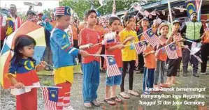  ??  ?? Kanak-kanak bersemanga­t menyanyika­n lagu Negaraku, Tanggal 31 dan Jalur Gemilang.