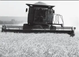  ??  ?? A combine harvester works on a 150 hectare wheat field at ARDA’s Jotsholo Estate recently. The Estate which was visited by the Vice President Emmerson Mnangagwa when wheat was still in infancy is under the Food and Nutrition cluster of Zim-Asset (...