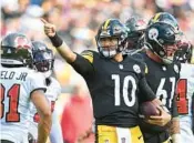  ?? JOE SARGENT/GETTY ?? QB Mitch Trubisky came off the bench to help rally the Steelers for a win over the Buccaneers on Sunday.