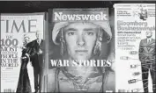  ?? Charles Krupa Associated Press ?? AT LEAST one reporter who produced unfavorabl­e coverage of Newsweek’s owner also was fired.