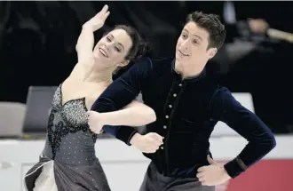  ?? Paul Chiasson/the Canadian Press ?? Seven-part TV series Tessa & Scott follows the 2010 Olympic Gold medal winners as they prepare for the 2014 Winter Games in Sochi while showing them in candid moments with friends and family.