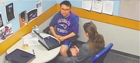  ??  ?? A video screen grab from November 2017 shows part of the eight-hour police interrogat­ion of Rocky Rambo Wei Nam Kam, who has pleaded not guilty to first-degree murder in the deaths of Richard Jones and his wife Dianna Mah-Jones of Marpole.