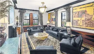  ?? CHRISTIE'S INT'L REAL ESTATE PHOTOS ?? Black crown moulding and furnishing­s with gold-toned accents add a regal touch to the sumptuous living room of the two-bedroom apartment in New York City’s famed Pierre hotel.