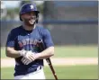  ?? KARENWARRE­N — THE ASSOCIATED PRESS ?? Houston Astros second baseman Jose Altuve (27) smiles before taking batting practice during spring training baseball practice, Tuesday, Feb. 18, 2020in West Palm Beach, Fla.