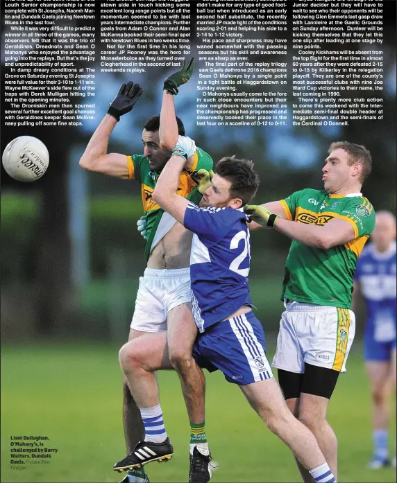  ?? Picture: Ken Finegan ?? Liam Dullaghan, O’Mahony’s, is challenged by Barry Watters, Dundalk Gaels.