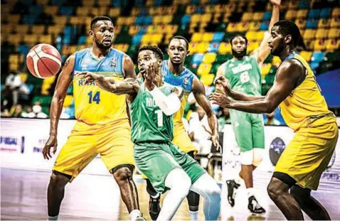  ??  ?? Point Guard, Ike Iroegbu, scored an amazing 17 points, four steals and six assists as Nigeria beat Mali 91- 68 in their final game of the FIBA Afrobasket qualifiers in Kigali, Rwanda… yesterday.