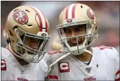  ?? PATRICK SMITH — GETTY IMAGES, FILE ?? The 49ers’ Jimmy Garoppolo talks with George Kittle during the first half of their game against Washington in October 2019 in Landover, Maryland.