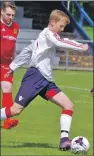  ??  ?? 16-year- old Ruairidh Horne in action against South Lochaber Thistle.