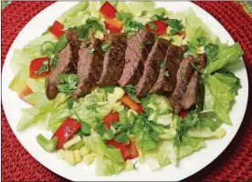  ?? LINDA GASSENHEIM­ER / TNS ?? Jerk Steak Salad.