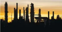  ?? IAN KUCERAK ?? The Imperial Oil Strathcona Refinery, seen at sunrise, is Canada’s sole production source of general aviation fuel.