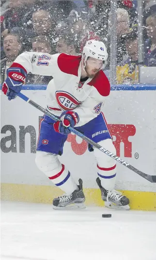  ?? THE ASSOCIATED PRESS ?? Habs forward Paul Byron controls the puck during first period action against the Sabres on Wednesday night in Buffalo. Byron drew an assist on Montreal’s lone goal by Tomas Plekanec in a 2-1 loss.