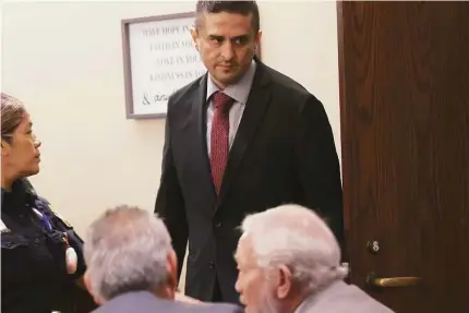  ?? Photos by Jerry Lara/staff photograph­er ?? Former U.S. Border Patrol supervisor Juan David Ortiz arrives at his continuing capital murder trial Wednesday. He is accused of killing four women in Laredo in September 2018. He faces up to life in prison.