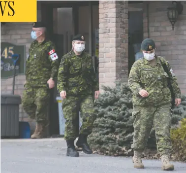  ?? GRAHAM HUGHES / THE CANADIAN PRESS ?? Canadian Forces members help out at Villa Val des Arbres, a long-term care home in Laval, Que., on April 19.
More than 1,000 military members are now helping the province with its COVID-19 response.