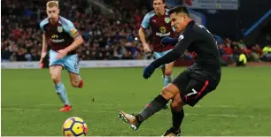  ?? AFP file ?? Arsenal’s Alexis Sanchez scores their first goal from the penalty spot against Burnley. —