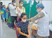  ??  ?? People line up to get jabbed at TMC vaccinatio­n centre at Patlipada, Ghodbunder Road, in Thane on Friday.