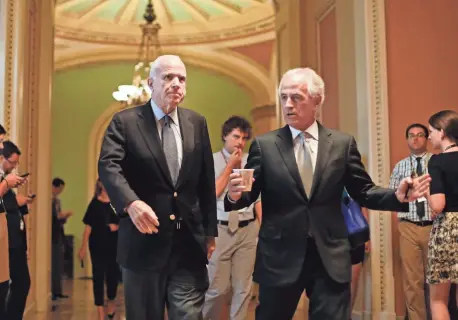  ?? PABLO MARTINEZ MONSIVAIS/AP ?? Republican Sens. John McCain (left) of Arizona and Bob Corker of Tennessee talk on Capitol Hill in Washington, D.C., on Thursday.