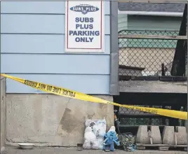  ?? CP PHoTo ?? A memorial sits outside of the home of seven-year-old victim Nathan Dumas in St. Catharines, Ont.