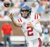  ?? ROGELIO V. SOLIS/AP ?? Ole Miss quarterbac­k Matt Corral throws a pass during the team’s spring game. The former UF commit has no regrets about switching schools.