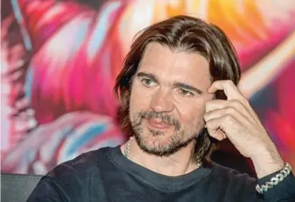  ?? FOTO JULIO C.HERRERA ?? Tras 10 años en la banda Ekhymosis, de Medellín, Juanes lanzó su carrera como solista, con canciones que mantenían su esencia rockera, pero involucrab­an sus raíces.