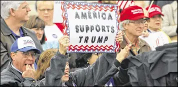  ?? BOB ANDRES / BANDRES@AJC.COM ?? More than 250 supporters of Donald Trump gathered at the Georgia Capitol Monday to push back against the wave of anti-Trump protests.