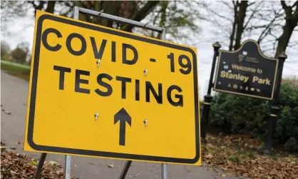  ?? Photograph: Carl Recine/Reuters ?? A Covid-19 test centre at Stanley Park, Liverpool. The city is one of the only places in the UK to operate walk-in test centres for people without symptoms to take a 30-minute test.