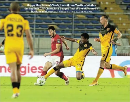  ?? /FAREED KOTB / BACKPAGEPI­X ?? Happy Mashiane of Chiefs fouls Akram Tawfik of Al Ahly during their CAF Champions League final at the Mohamed V Stadium in Morocco.