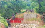 ?? ANI ?? Assam officials alleged that Mizoram started constructi­ng a bridge at Kachurthal in its territory on Friday.