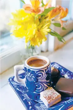  ??  ?? A cup of Kakawa’s American elixir with a tiramisu truffle, rose caramel and berries & champagne truffle, photo Gabriela Campos
/The New Mexican; left, oysters at Piñon Café; photo Luis Sánchez Saturno/The New Mexican