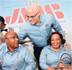  ?? Rudolph Brown/Photograph­er ?? JMMB Group CEO Keith Duncan (centre) greets board directors Andrew Whyte and Audrey Deer-Williams at the company’s annual general meeting at The Jamaica Pegasus hotel in New Kingston on Wednesday, September 19, 2018.
