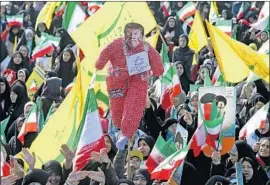  ?? Ebrahim Noroozi Associated Press ?? A TRUMP EFFIGY at a rally in Tehran. Demonstrat­ions across Iran were a show of strength by the ruling theocracy in the wake of anti-government protests.