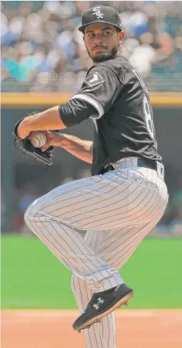  ?? GETTY IMAGES ?? “He was definitely able to get into a groove after that first inning,” catcher James McCann said of Dylan Cease (above), who allowed three runs in five innings.