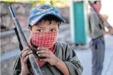  ?? FOTO: PEDRO PARDO/AFP ?? Handlanger für die Drogenkart­elle: Kinder in Mexiko werden vom organisier­ten Verbrechen instrument­alisiert.
